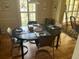 Traditional dining room featuring hardwood floors and a dark wood table setting for a sophisticated dining experience at 206 Brailsford Rd, Summerville, SC 29485