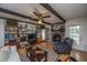 The living room features a brick fireplace, built-in bookshelves, and comfortable seating at 206 Brailsford Rd, Summerville, SC 29485