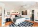 Bright bedroom featuring a red bed frame and blue and white accents at 2114 Pettigrew St, Sullivans Island, SC 29482