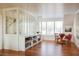 Spacious bonus room featuring a game table, bright windows, and charming decor at 2114 Pettigrew St, Sullivans Island, SC 29482