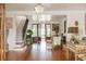 Foyer with hardwood floors, wooden doors, staircase and artistic decorations at 2114 Pettigrew St, Sullivans Island, SC 29482