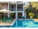 Refreshing swimming pool with lounge chairs, a patio, and a view of the home's architecture at 2114 Pettigrew St, Sullivans Island, SC 29482