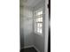 Walk-in closet featuring natural light from a window and a built-in shelf for organization at 212 Blue Heron Dr, Summerville, SC 29485