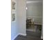 Dining room view from the hallway, showcasing a modern light fixture and wall art at 212 Blue Heron Dr, Summerville, SC 29485