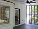 Sunroom showcasing brick exterior and interior view of the home's living room at 212 Blue Heron Dr, Summerville, SC 29485