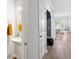 Hallway view features a powder room, a door to the stairs and a glimpse into the living area at 2308 Watchtower Ln, Charleston, SC 29414