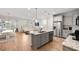 Beautiful kitchen with an island, stainless steel appliances, granite countertops, and hardwood floors at 2308 Watchtower Ln, Charleston, SC 29414