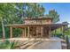Community pavilion with outdoor seating, a fireplace and lush greenery at 2308 Watchtower Ln, Charleston, SC 29414