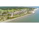 Aerial view of resort with golf course, beach, and ocean at 2401 Racquet Club Dr, Seabrook Island, SC 29455