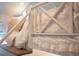 Comfortable sleeping space with white wooden rails and cozy bedding at 2401 Racquet Club Dr, Seabrook Island, SC 29455
