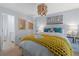 Cozy bedroom featuring a comfortable bed with plush pillows and a soft yellow throw blanket at 2401 Racquet Club Dr, Seabrook Island, SC 29455