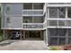 Exterior of condo unit showing parking underneath and multiple balconies at 2401 Racquet Club Dr, Seabrook Island, SC 29455