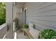 Charming front porch with seating area and decorative accents at 2401 Racquet Club Dr, Seabrook Island, SC 29455