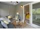 Relaxing patio with cozy seating, decorative accents, and seamless access to the indoors at 2401 Racquet Club Dr, Seabrook Island, SC 29455