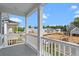 Open-air balcony offers views of the new homes and neighborhood, perfect for relaxation and outdoor enjoyment at 308 O'Malley Dr, Summerville, SC 29483