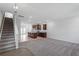 Inviting living space showcasing an open floor plan, stairs, and an abundance of natural light at 308 O'Malley Dr, Summerville, SC 29483