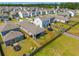 Aerial view of the backyard featuring the porch, yard, trampoline, and play area at 314 Bear Paw Ln, Summerville, SC 29486