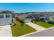New home showcasing the driveway, front yard, and garage, perfect for a Gathering at 314 Bear Paw Ln, Summerville, SC 29486