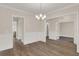 Spacious dining room featuring chair rail and hardwood flooring at 318 O'Malley Dr, Summerville, SC 29483