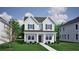 Charming two-story home featuring a well-manicured lawn and classic architectural details at 318 O'Malley Dr, Summerville, SC 29483