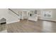 Open floor plan showcases a modern kitchen and living room area at 318 O'Malley Dr, Summerville, SC 29483