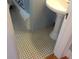 Bathroom floor with black and white mosaic tiling at 32 Rosedale Dr, Charleston, SC 29407