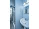 Bathroom with a tiled bath and a pedestal sink at 32 Rosedale Dr, Charleston, SC 29407