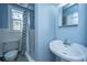 Bathroom in blue with combined bath and shower at 32 Rosedale Dr, Charleston, SC 29407