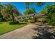 Single story home with an attached carport and storage shed in the backyard at 32 Rosedale Dr, Charleston, SC 29407