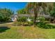 Charming home with front yard shaded by a beautiful palm tree at 32 Rosedale Dr, Charleston, SC 29407