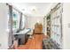 Bright and airy office space featuring a desk, natural light, and wooden floors, creating a productive and comfortable work environment at 32 Rosedale Dr, Charleston, SC 29407