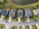 Overhead view of houses on a street around a pond at 321 Sanctuary Park Dr, Summerville, SC 29486