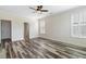 Neutral bedroom with multiple windows and vinyl floors at 321 Sanctuary Park Dr, Summerville, SC 29486