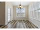 Bright dining room with wood floors, chandelier, and access to the exterior at 321 Sanctuary Park Dr, Summerville, SC 29486