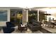 Bright and airy living space with sliding glass doors to a balcony at 330 Concord St # 11B, Charleston, SC 29401