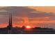 Beautiful sunset view overlooking city buildings, with a bright sun and colorful sky at 330 Concord St # 11B, Charleston, SC 29401