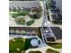 Aerial view of community highlighting lush landscaping and colorful townhomes at 330 Concord St # 15B, Charleston, SC 29401