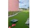 Enjoy backyard cornhole with views of the American flag and lawn at 330 Concord St # 15B, Charleston, SC 29401