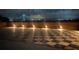 A custom-built deck is illuminated by string lights, offering a cozy outdoor experience and a bridge view at 330 Concord St # 15B, Charleston, SC 29401