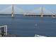 Enjoy the breathtaking water views from this stunning property, with a boat sailing under the Ravenel Bridge at 330 Concord St # 15B, Charleston, SC 29401