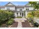 Charming backyard with a stone patio, manicured landscaping, and a well-maintained lawn at 3372 Billings St, Mount Pleasant, SC 29466