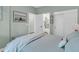 Serene bedroom with a connecting bathroom view, sliding door closet, and a soothing color scheme at 3372 Billings St, Mount Pleasant, SC 29466
