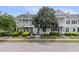 Charming two-story townhouse with a welcoming front porch and manicured landscaping at 3372 Billings St, Mount Pleasant, SC 29466