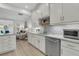 Contemporary kitchen boasting white cabinets, marble countertops, and stainless steel appliances at 3372 Billings St, Mount Pleasant, SC 29466