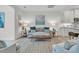 Inviting living area with plush seating, a soft rug, and an open layout leading into the kitchen at 3372 Billings St, Mount Pleasant, SC 29466