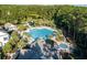 Aerial view of community pool featuring winding waterslide, splash pad and lounge chairs at 3372 Billings St, Mount Pleasant, SC 29466