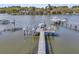 Home boasting a private boat dock, boat lift, and kayak parking for ultimate waterfront enjoyment at 3610 Legareville Rd, Johns Island, SC 29455