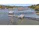 Home featuring private boat dock and channel access, equipped with boat lift, and kayak parking at 3610 Legareville Rd, Johns Island, SC 29455
