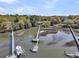 Home featuring private boat docks with boat lifts and kayak parking surrounded by lush marshlands at 3610 Legareville Rd, Johns Island, SC 29455