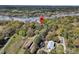 Expansive land featuring equestrian facilities, a pond, and lush greenery, offering serene living with rural charm at 3610 Legareville Rd, Johns Island, SC 29455